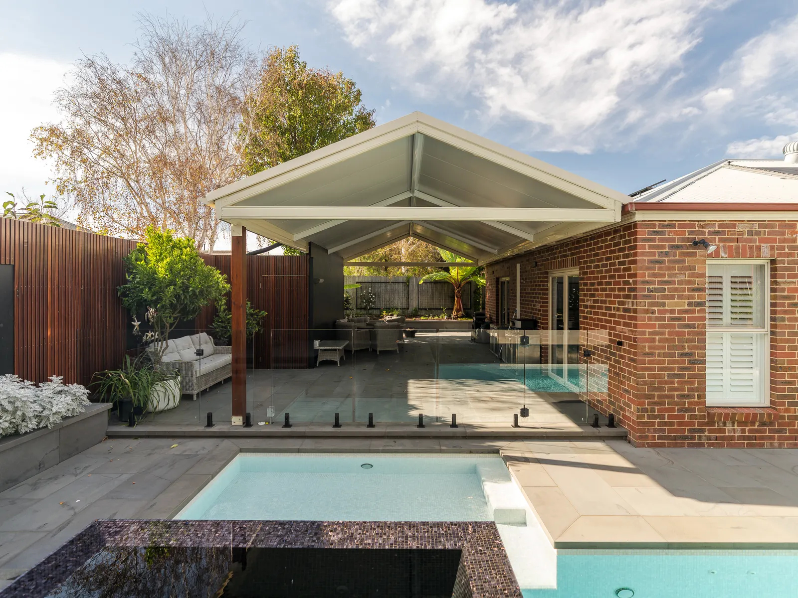 Finished gable pergola beside a pool, Safety Beach
