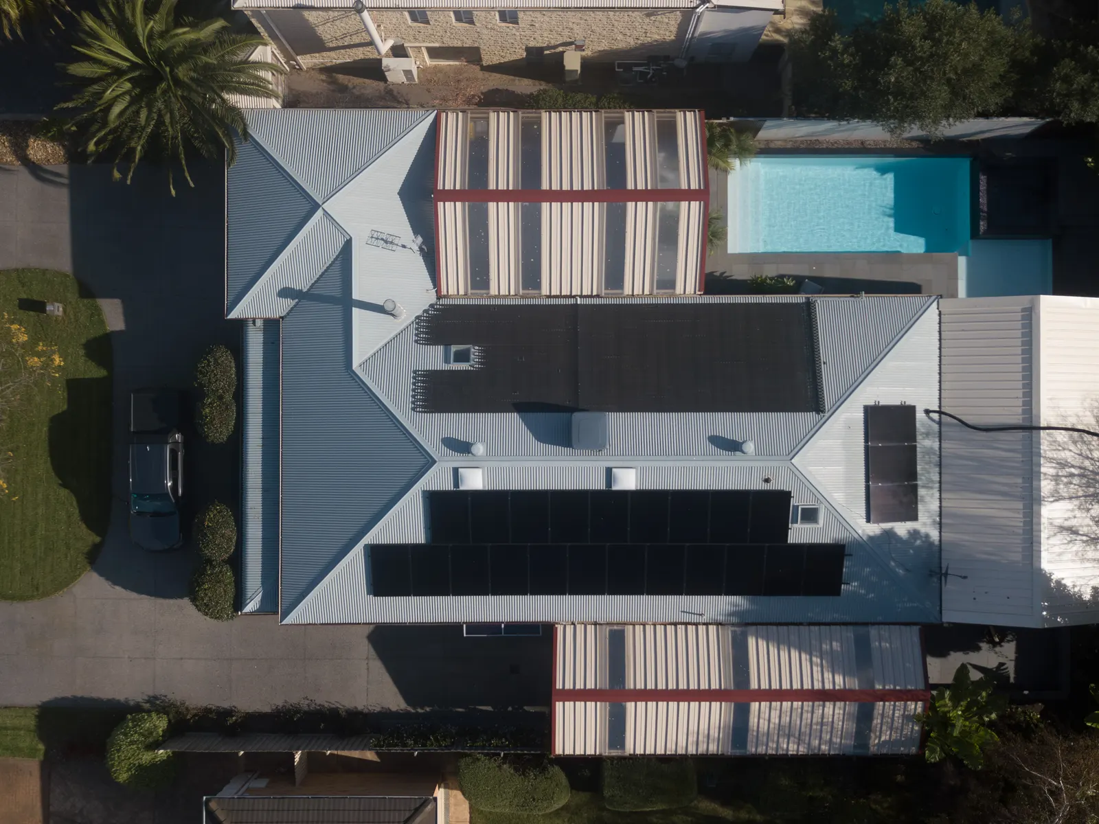 Drone view of a home with a new pergola and pool, Safety Beach