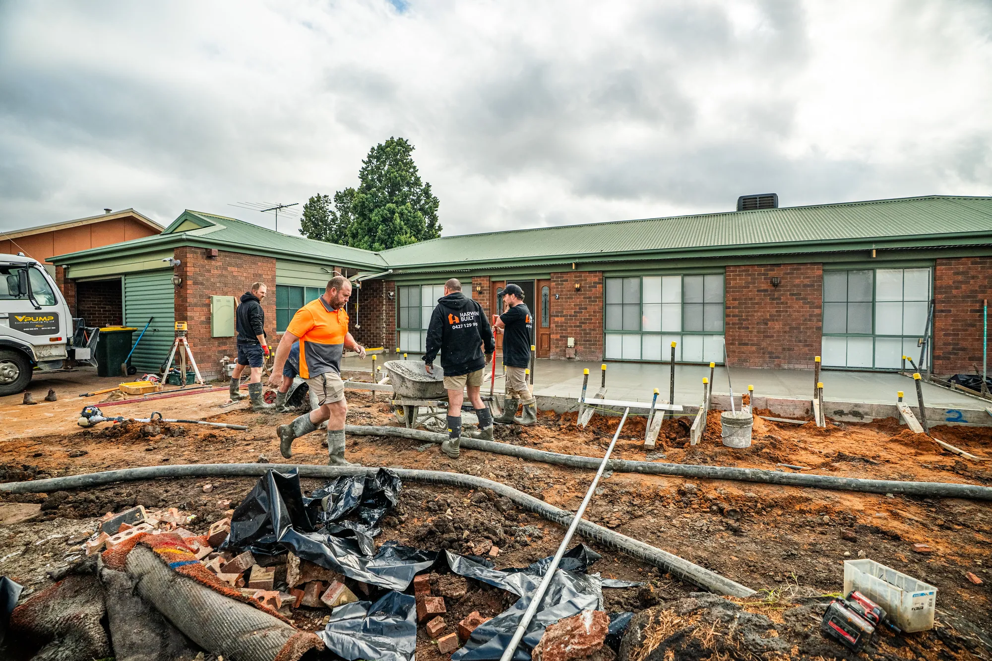 The Harwin Built crew pouring a concrete slab